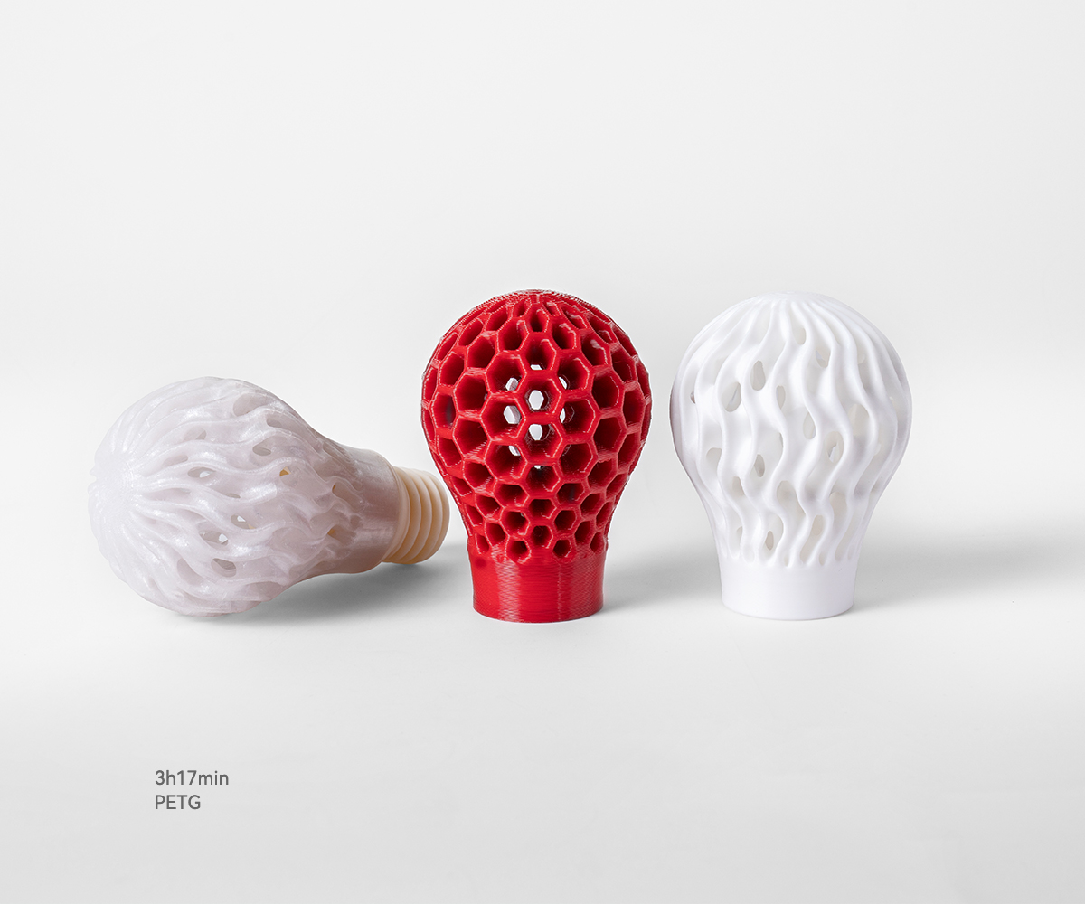 Three light bulb housing in HS PLA Rainbow printed by Flashforge adventurer 5m 3d printer